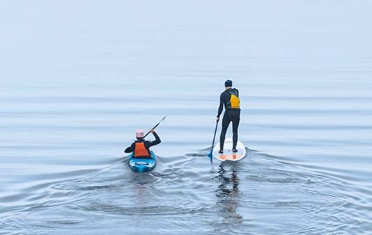 Group,Of,Athletes,Kayak,And,Stand,Up,Paddle,On,The